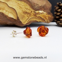 Barnsteen oorknopjes 925 met bloem 10 mm